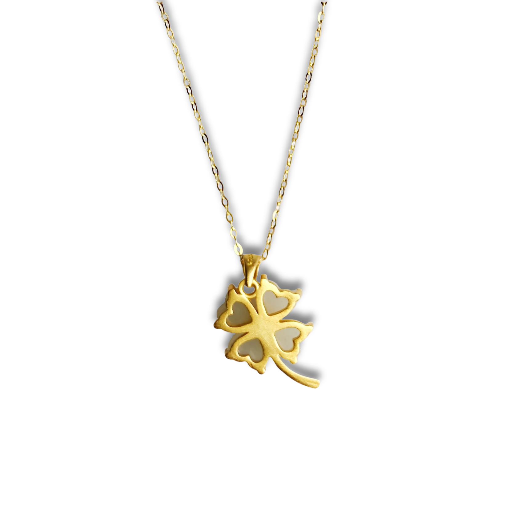 the back of a Gold necklace with a clover-shaped pendant on a white background