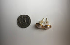 gold pearl stud earrings compare the size with a quater coin