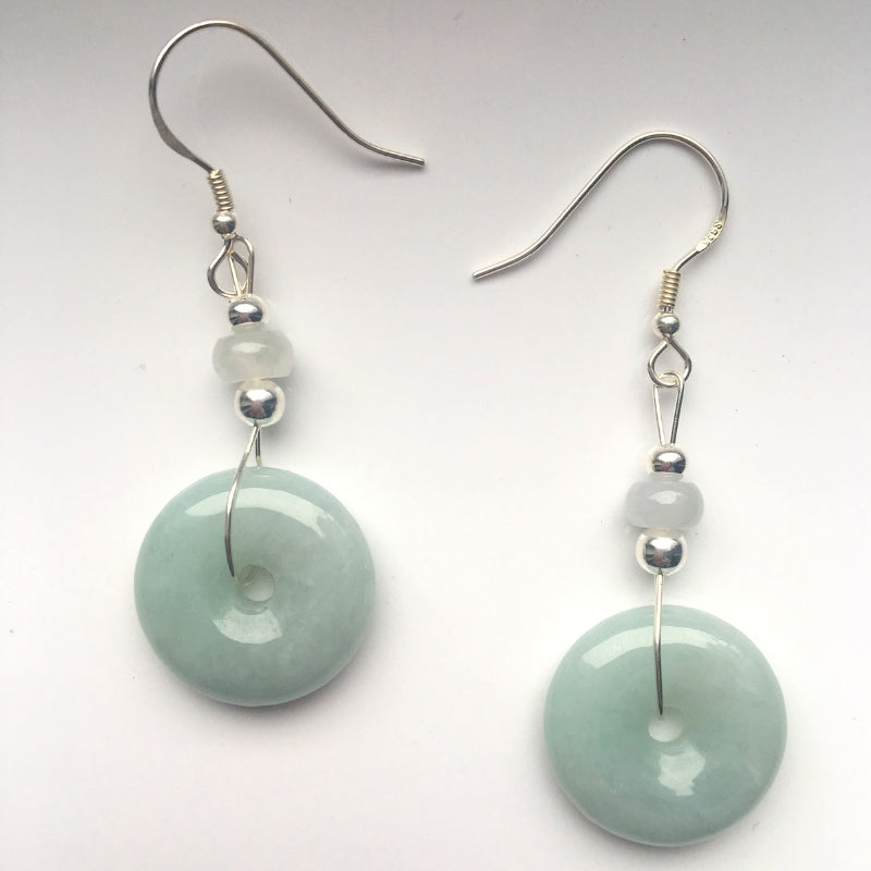 light green jade donut earrings in sterling silver dangle style, front view