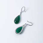 Front and back side of Green jade earrings in teardrop shape, ideal for gifting