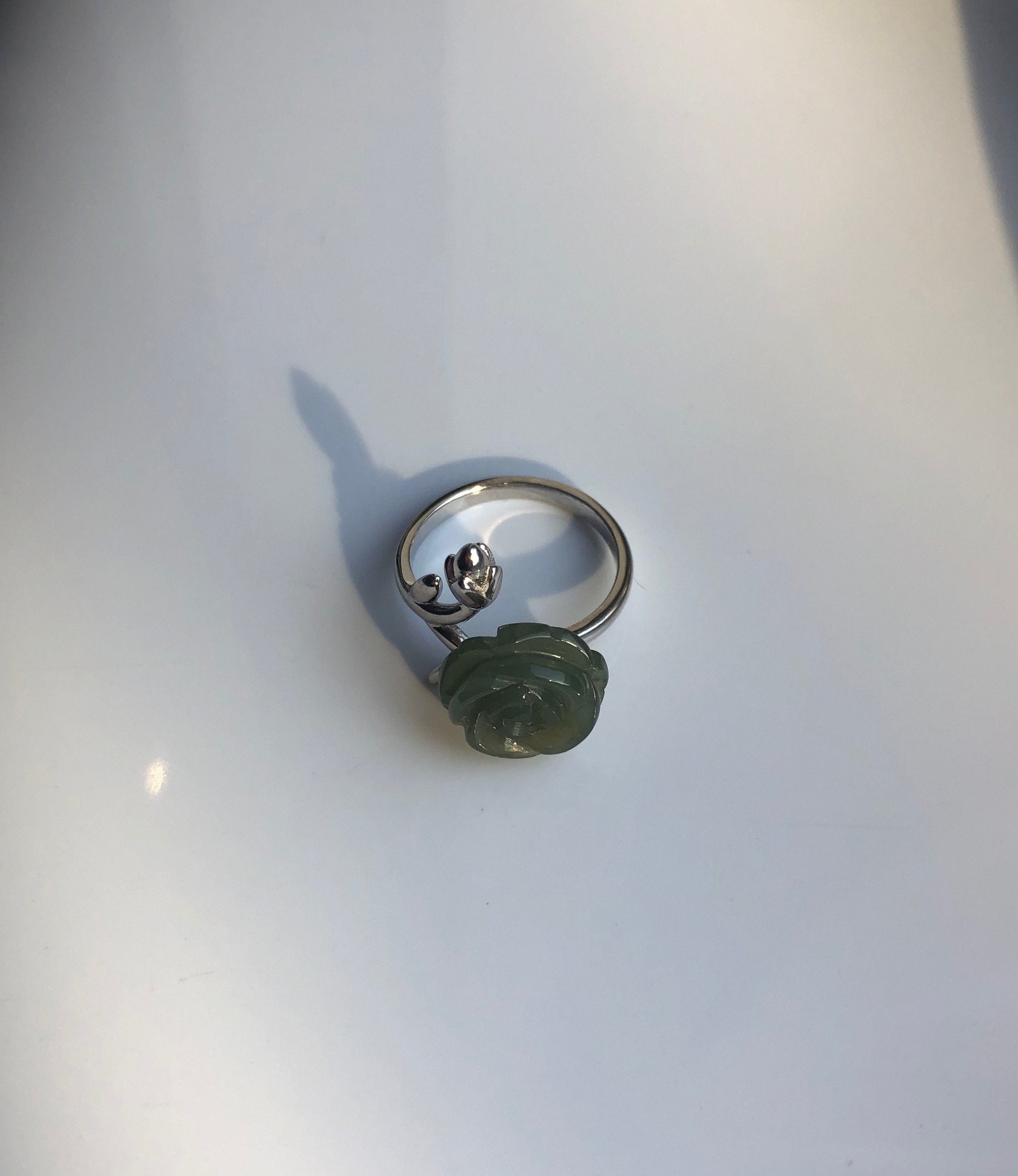 Natural jade flower ring in silver – side view