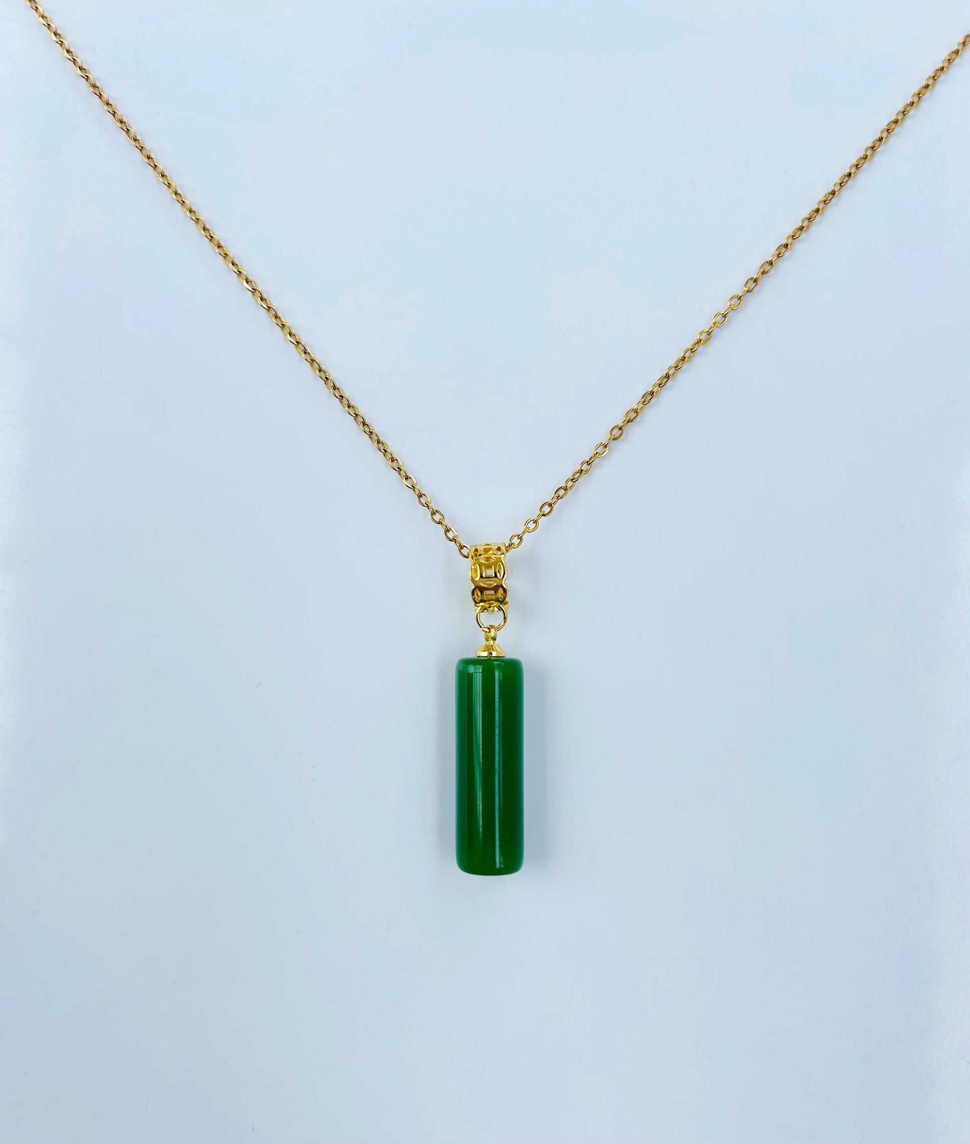 18 inch green jade pillar necklace with gold chain, front view of simple minimalist design