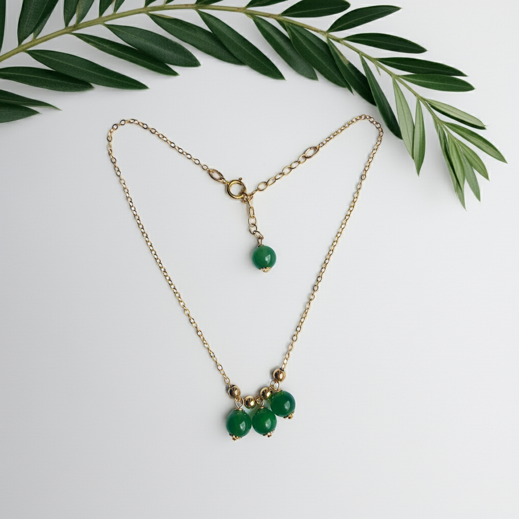 jade anklet with green leaf decorations