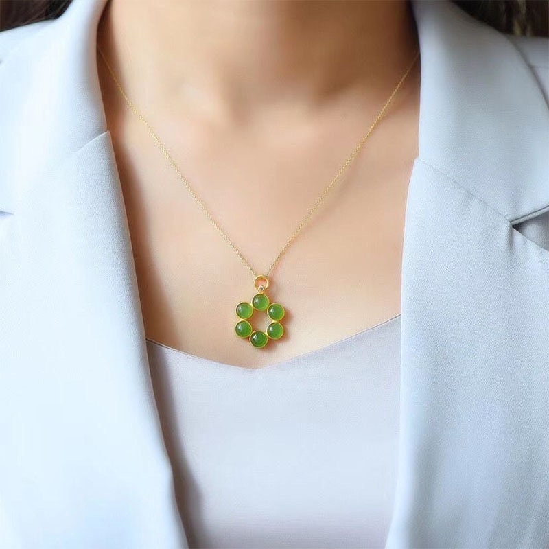 Model wearing spiritual green jade necklace with hexagram pendant