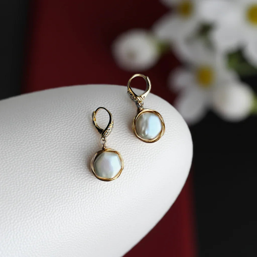 Front view of modern irregular pearl dangle earrings with 14k gold filled hooks