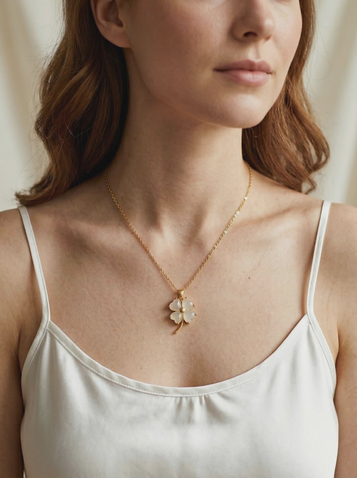 Video of model wearing 18'' white jade clover necklace