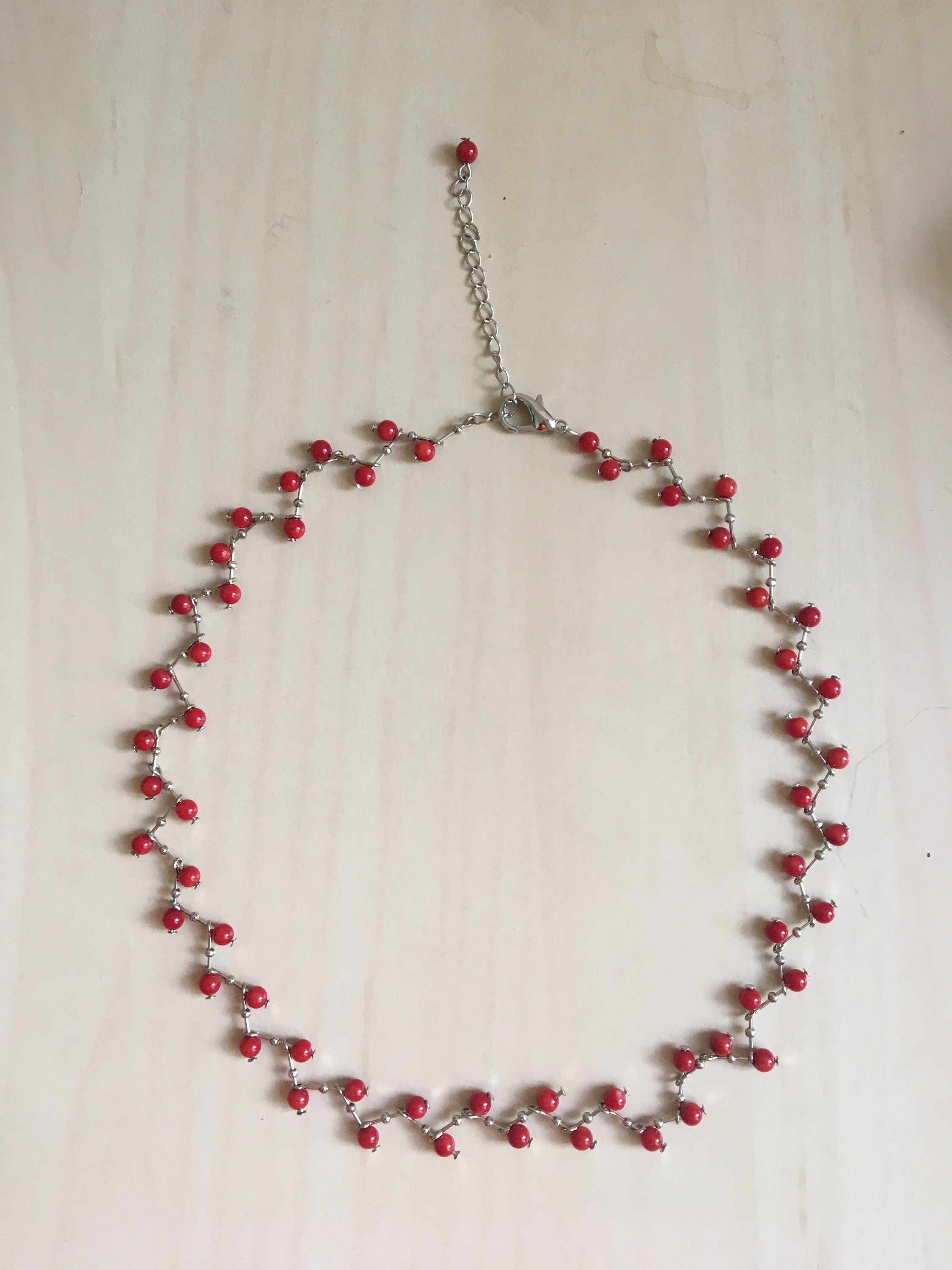full view angle of red coral necklace