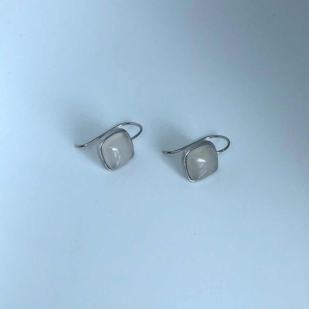Front view of minimalist white jade square earrings with 990 sterling silver hooks